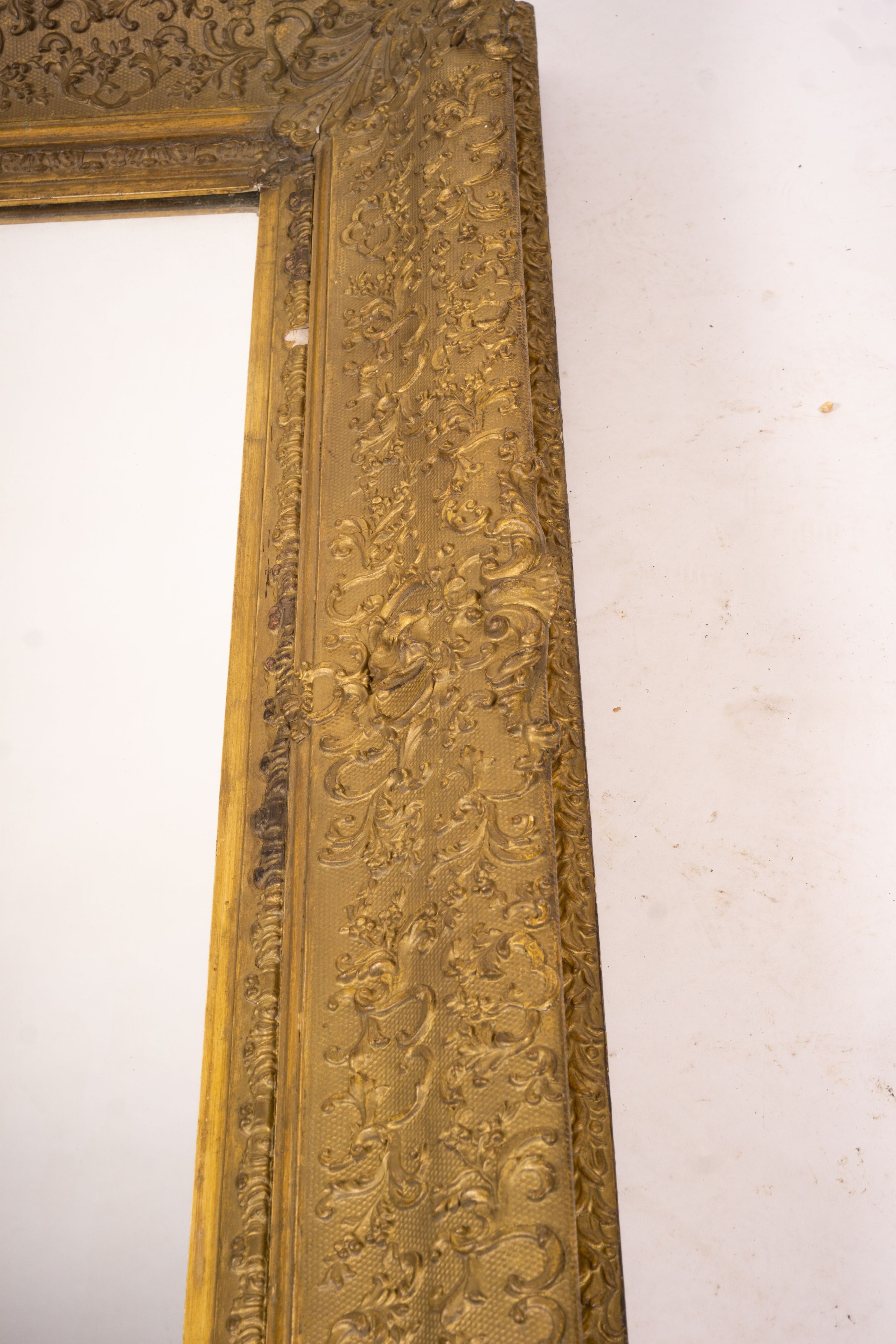 A Victorian gilt gesso wall mirror, W.104cm H.124cm